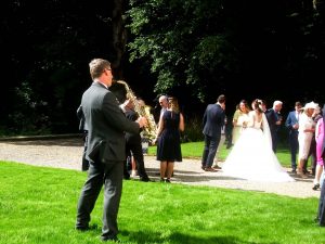 Wedding sax player at Storrs Hall, Windermere, Cumbria